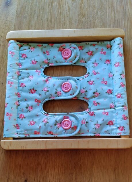 Dressing Frames with Large Buttons