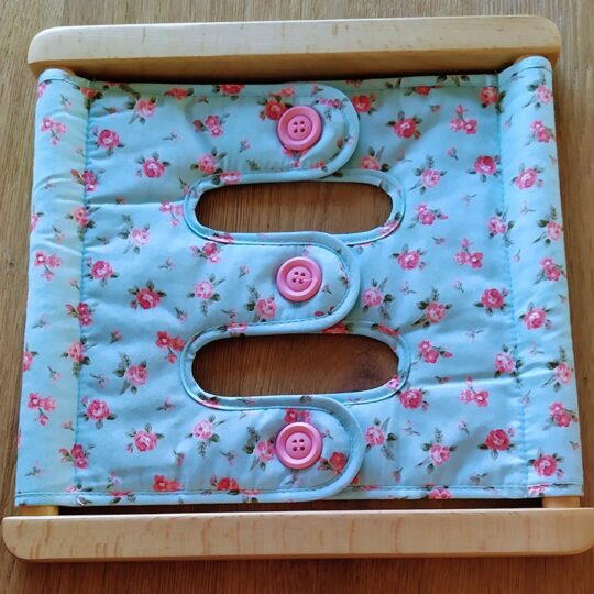 Dressing Frames with Large Buttons